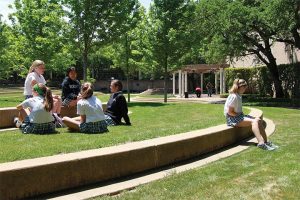 ON THE OUTSIDE LOOKING IN Students try to find their place in the tight-knit social groups. Photo by Mary Clare