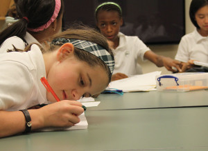 DEVELOPING FILM Fifth-grader Faith Wangermann brainstorms ideas for her film in one of the after school programs for Middle Schoolers. PHOTO BY SYDNEY YONACK