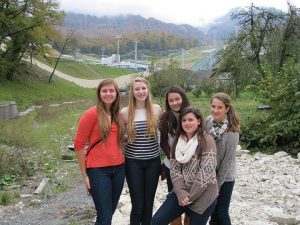 VOYAGE TO RUSSIA Sophomores Darcy Malican, Alexandra Randolph, Sarah Chan, Allison Lanfear, and Kate Cooper visit a former Olympic venue that was used for a long jump ski competition. Photo by Anne-Marie Corley