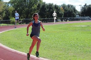 RUNNING ON THE SAME TRACK Sisters Tala and Adoette Vaughan follow in their mother Glenys Quick’s footsteps. Photo by Claire Fletcher