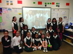 BRIDGING THE DISTANCE Third graders Skype with students from the Colegio Internacional Puerto La Cruz International school in Barcelona, Venezuela. Photo provided by Karen Roberts