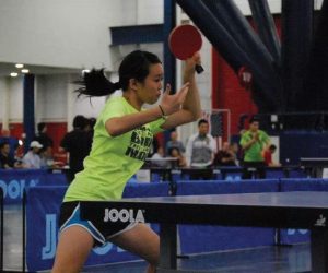 PLAYING TO THE TOP Sophomore Jessica Wang plays in an intense ping pong match at the USATT  Junior Olympics in Las Vegas, Nevada in 2011. PHOTO PROVIDED BY JESSICA WANG