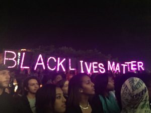 IN PROTEST Senior Azani Creeks attended a protest against the injus¬tices from the Dallas Police Department. Fellow protests held up signs such as “Black Lives Matter.” PHOTO BY AZANI CREEKS 