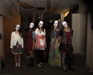 SILENT STARES Seniors Snow Zhou, Shriya Das, Sarah Zhou, Leah Cohen and Mary Zhong are dressed as dolls to portray the American Horror Story theme. PHOTO PROVIDED BY CHARLOTTE HOSKINS 