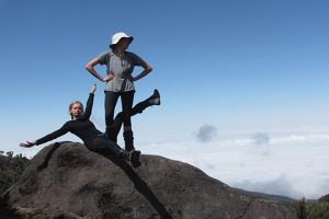 ON CLOUD NINE McManemin and her sister, Audrey McManemin, strikes a pose on their way to the top of Mount Kilimanjaro 