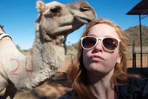 CAMEL-FLAGE McManemin blends in and interacts with animals during her stay in Australia.  