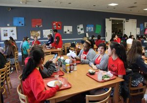 A SEA OF RED Upper School students get decked out in red shirts to celebrate National Wear Red Day. PHOTO CREDIT TO SONYA XU