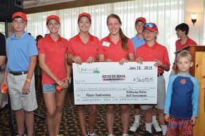 GOLFING FOR A CAUSE Eighth grader Charlse Doan poses with the check the KidSwing event raised for Scottish Rite PHOTO PROVIDED BY RICK SMITH 