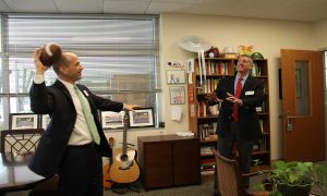 PASSING ON THE JOB Upper School Head passes off his job to Terry Murray, the Upper School Head effective in July.