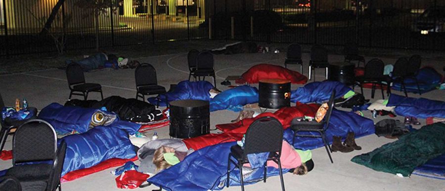 12 a.m. Nov. 19.
Penelope Picagli, asleep in the center, simulated what it would be like to sleep on the streets. Photo provided by Promise House