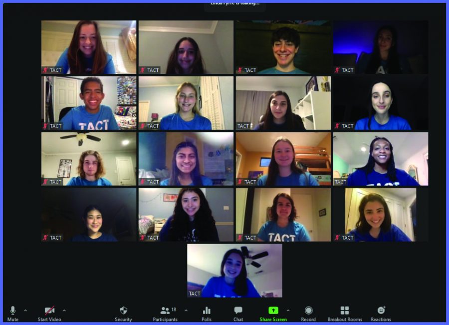 Clad in matching blue T-shirts, members of TACT smiled for a Zoom photo after filming several skits to send to groups without access to live Zoom performances. “Being virtual has been really cool because we got to perform for groups in other places we normally wouldn’t get to, like Austin and Utah,” Ellis said. 
