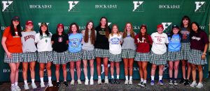 Class of 2022 student-athletes gather on signing day.