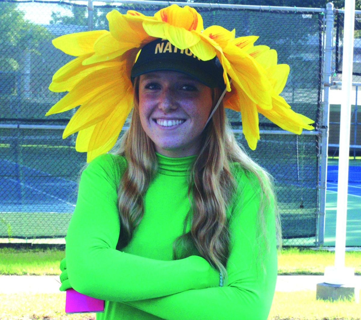 Junior DixeyPiper Auer sports a makeshift Daisy mascot costume to a spirit day. The Athletics Board and department are working towards designing and acquiring an official mascot costume. 