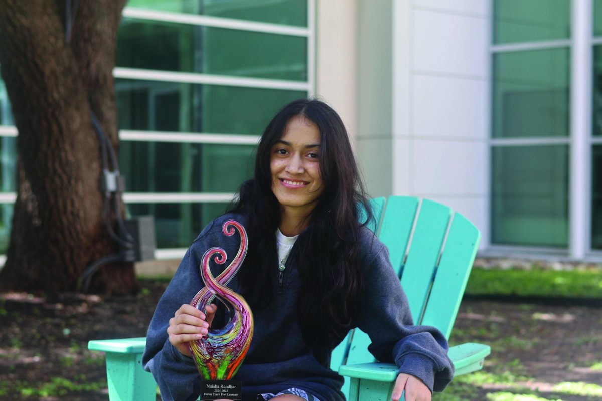 Randhar poses with her trophy.