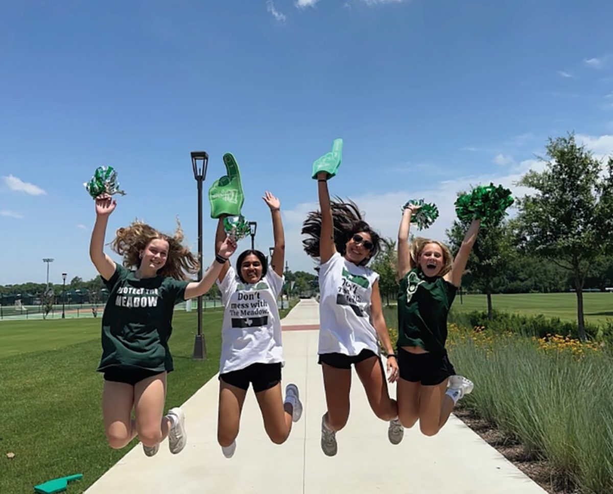 The Hypewomen jump for joy.