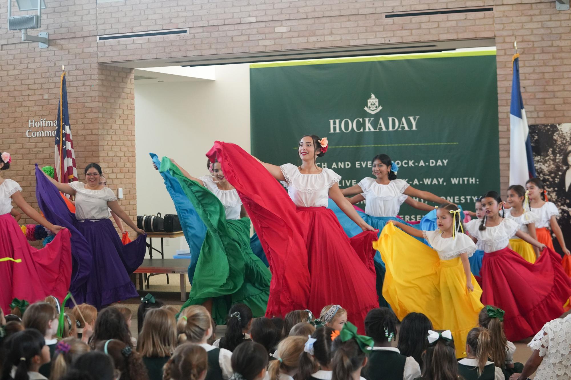 Latin Hispanic Student Union students dance baile folklórico during a Hispanic Heritage Month celebration.