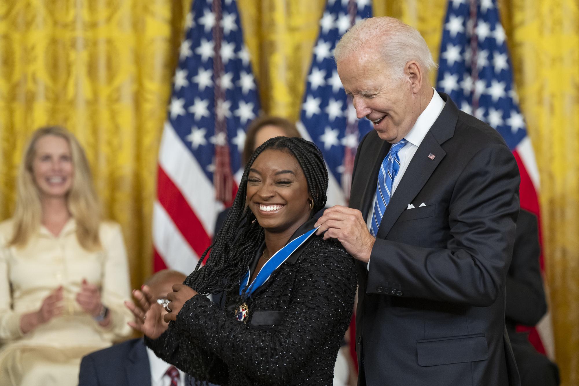 Gymnast Simone Biles receives a Presidential Medal of Freedom from President Joe Biden on July 7, 2022 for being "a prominent advocate for athletes’ mental health and safety, children in the foster care system and victims of sexual assault."