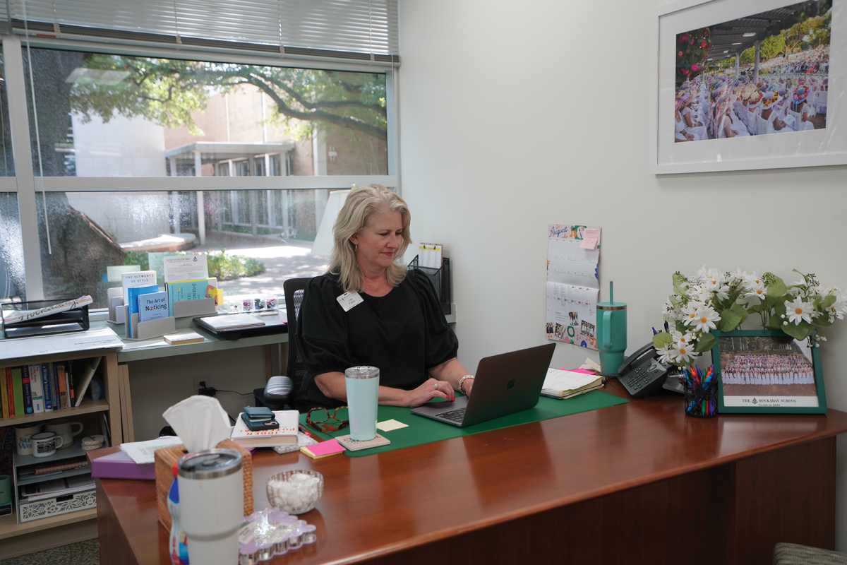 Fisher working in her office