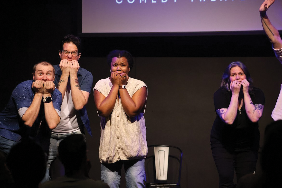 Robinson performing improv at Stomping Ground Comedy Theater