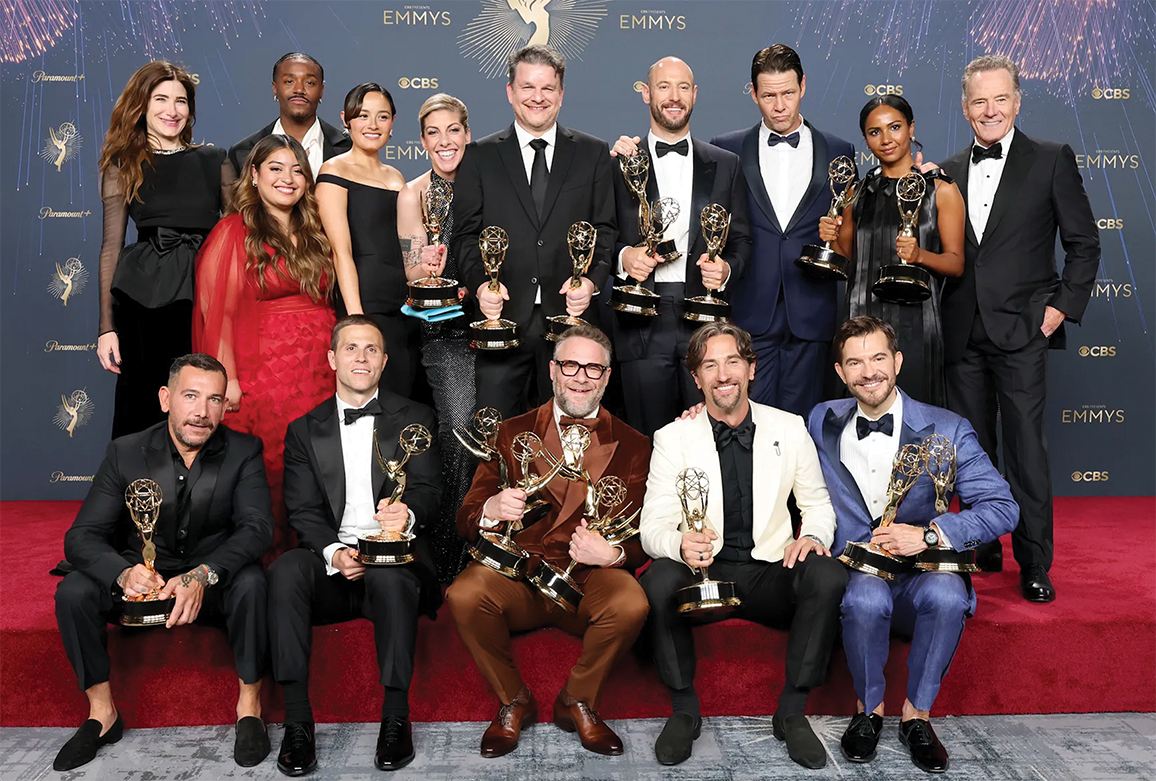 The cast and crew of "The Studio" pose with their Emmys.
