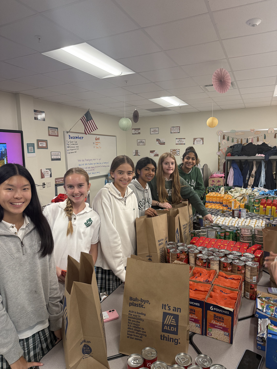 Students pack items at Marcus Mart