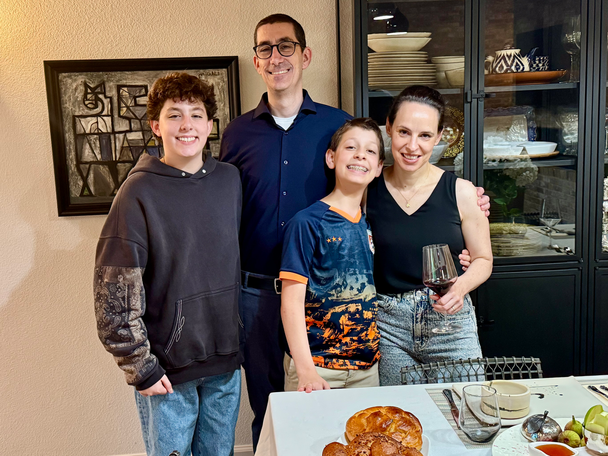 The Moed family enjoys their dinner.  