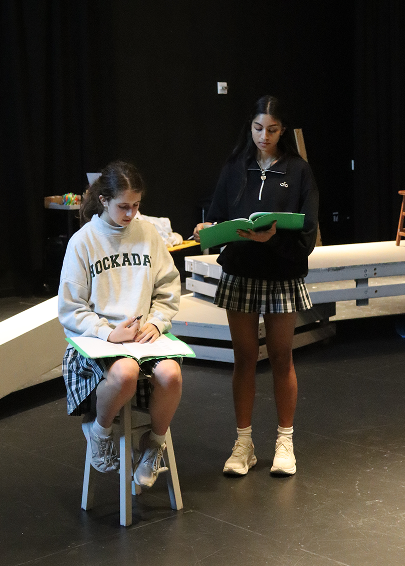 Hayes and Guttigoli rehearse scene.